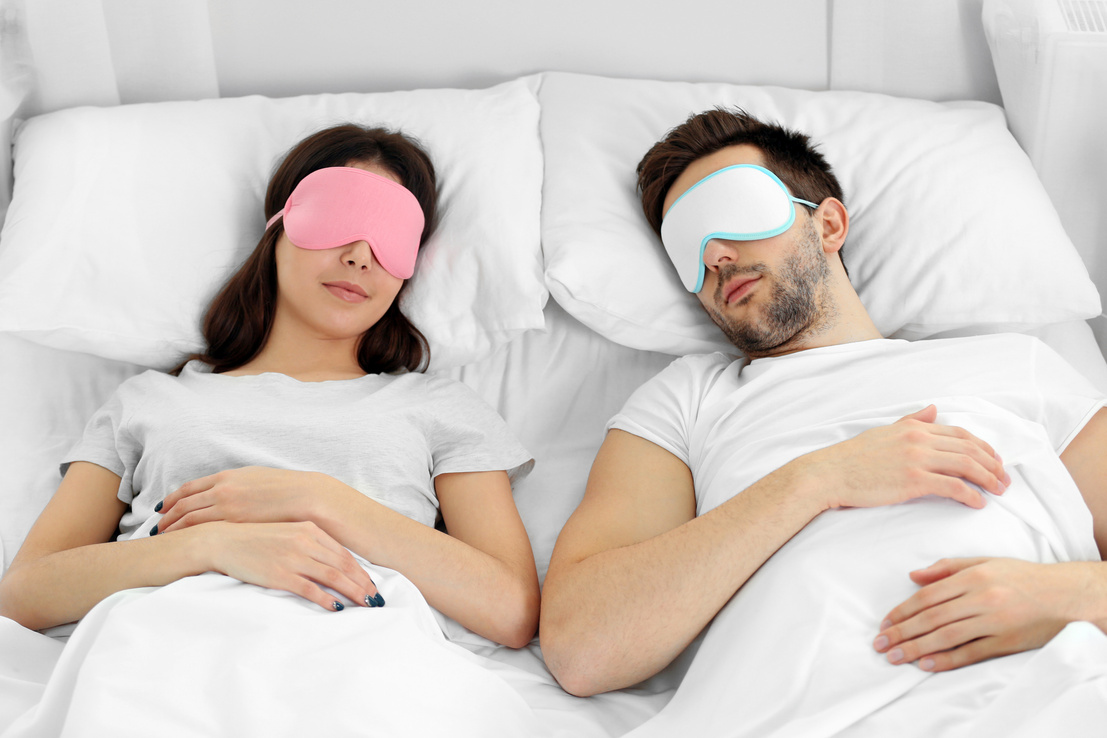 Couple Sleeping with Eye Masks 